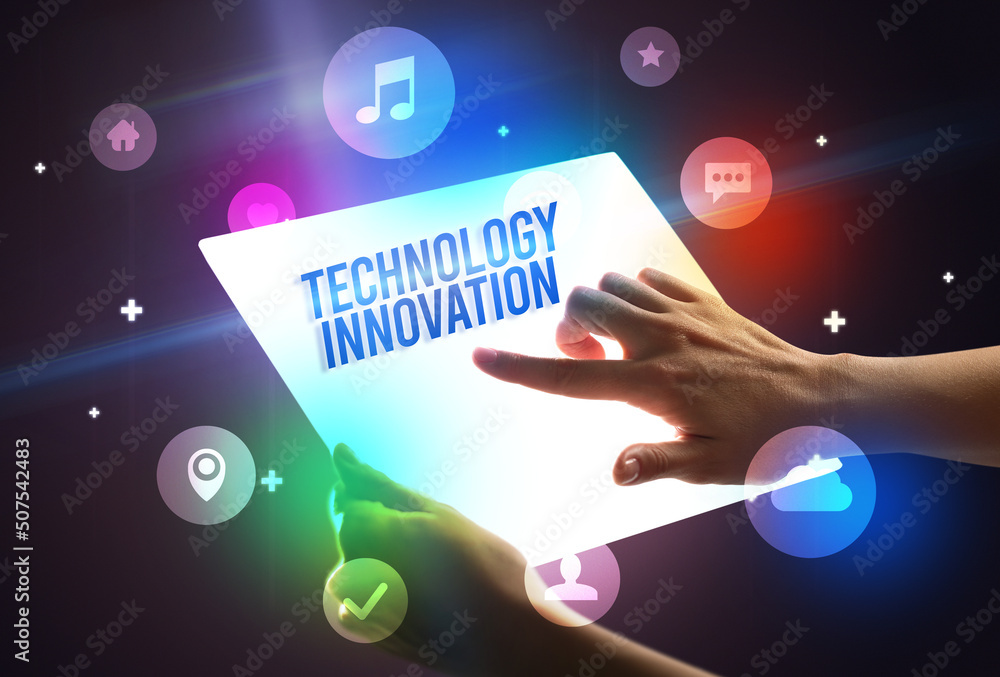Holding futuristic tablet, new media concept Holding futuristic tablet, new media concept