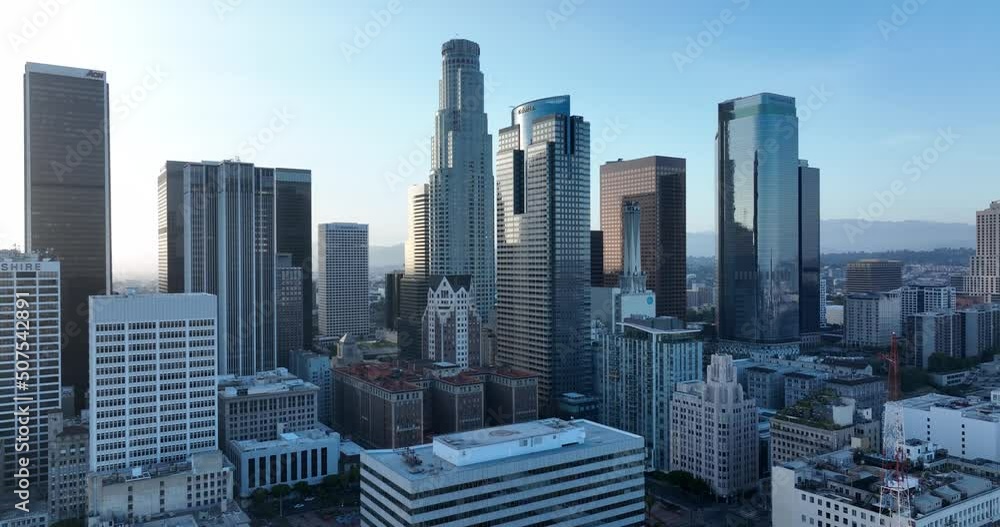 Aerial fly over streets and cityscapes skyscrapers in Los Angeles suburbs California, USA. Aerial fly over streets and cityscapes skyscrapers in Los Angeles suburbs California, USA.