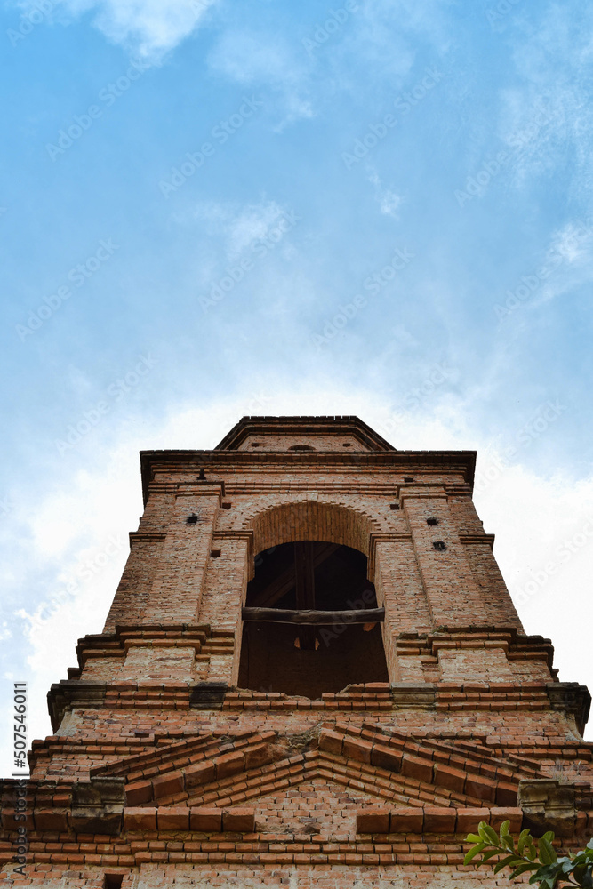 Brick bell tower of the church
