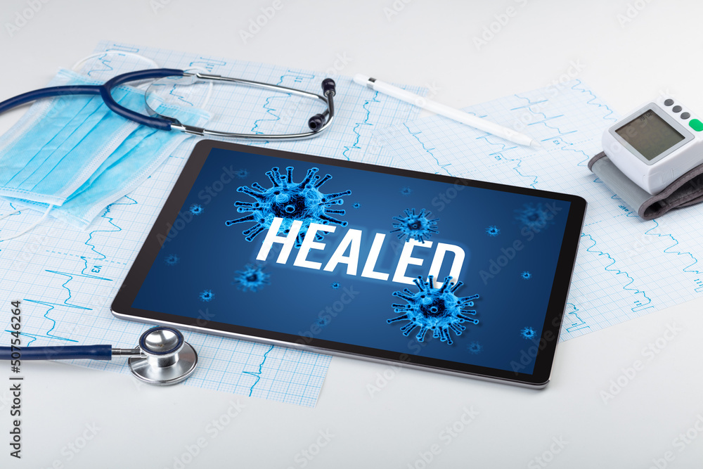 Tablet pc and doctor tools on white surface Tablet pc and doctor tools on white surface