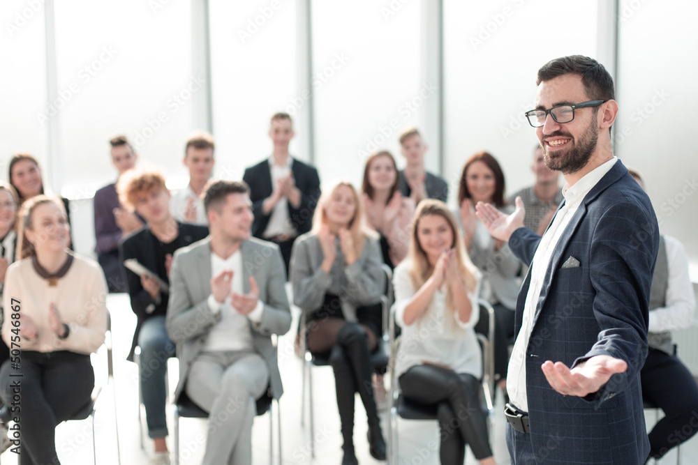 close up. business man standing in the conference roo close up. business man standing in the conference roo