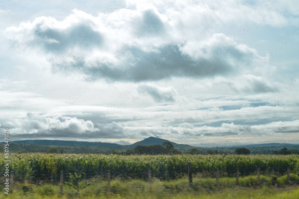 Clouds over the mountains - car view