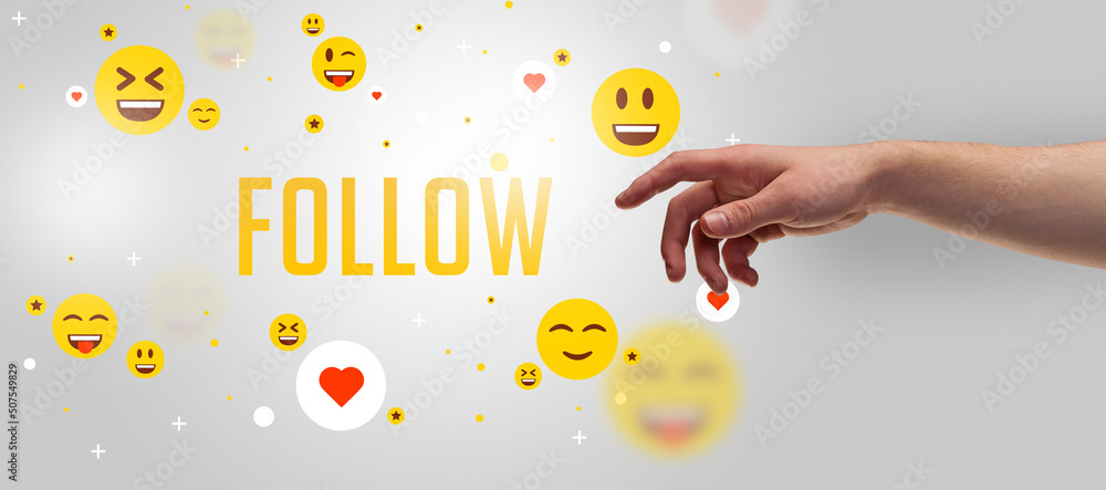 Close-Up of cropped hand pointing at social media concept Close-Up of cropped hand pointing at social media concept