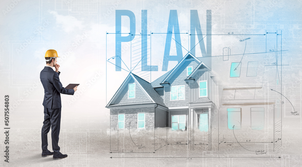 Young engineer holding blueprint concept Young engineer holding blueprint concept