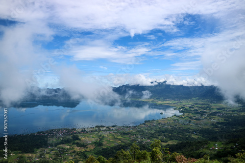 Danau Maninjau is an impressive volcanic lake at the bottom of an immense caldera measuring 20 kilometres by 8 kilometres and created about 50,000 years when a massive volcano erupted. © Fani