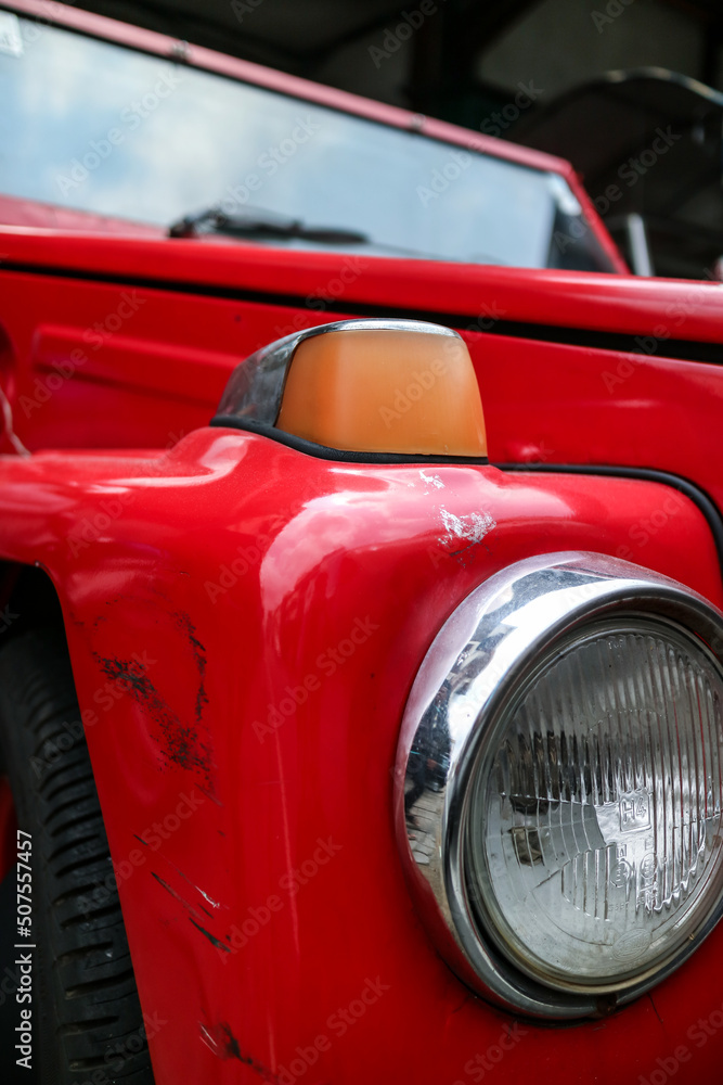 close up shot of antique red car