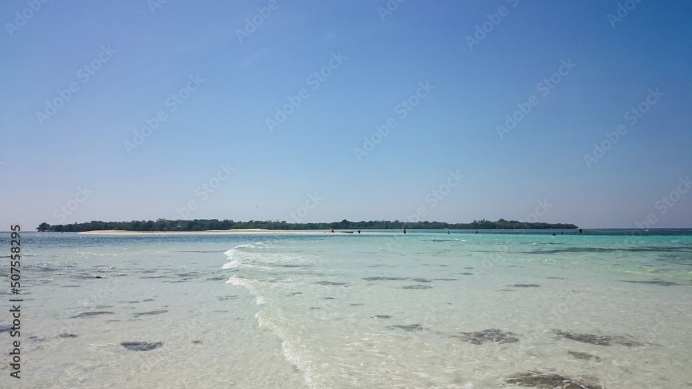 Obraz premium Alor Island has a very beautiful beach. Beach with white sand and very clear water. Alor Island has stunning views and nature.
