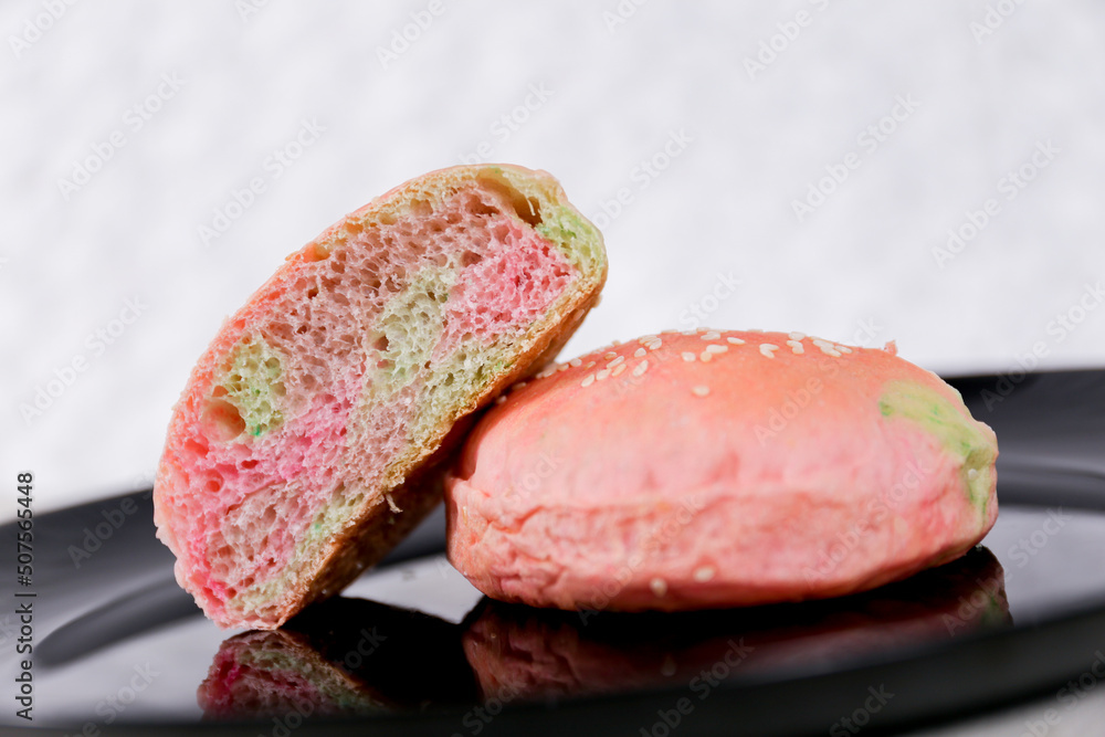 Rainbow burger buns with sesame set with copy space for text
Rainbow burger buns with sesame set with copy space for text