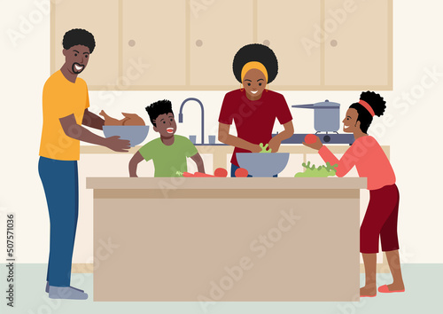 Happy black family having fun cooking at home together