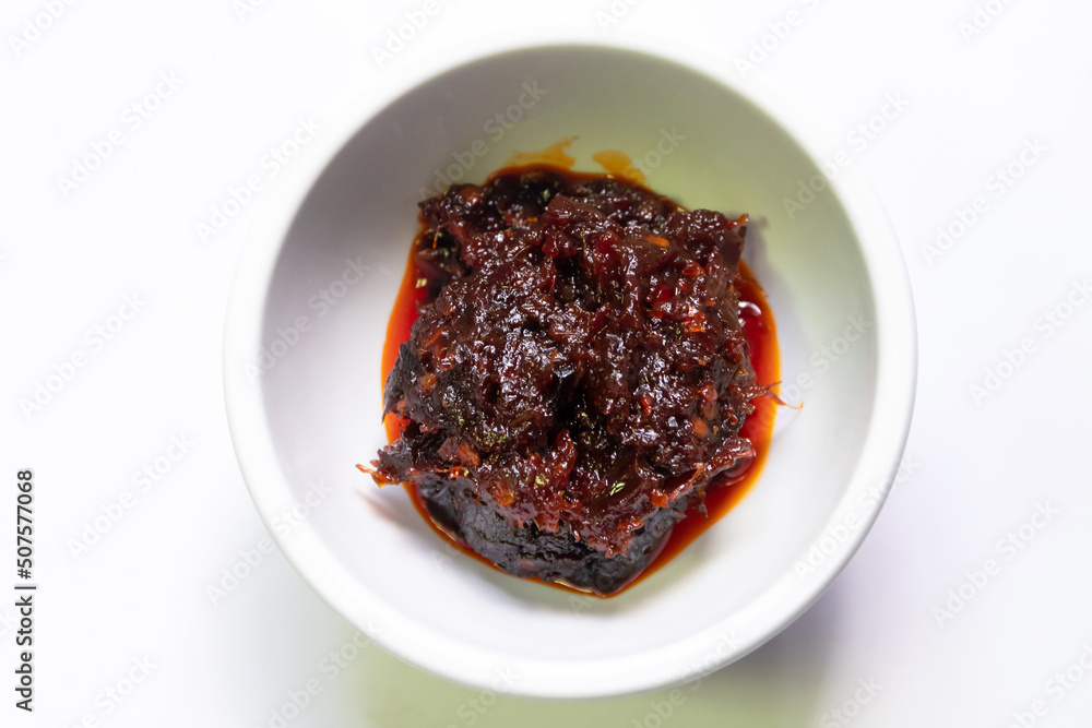 Thai chili paste (Nam Prik Pao) is a common ingredient used in Thai