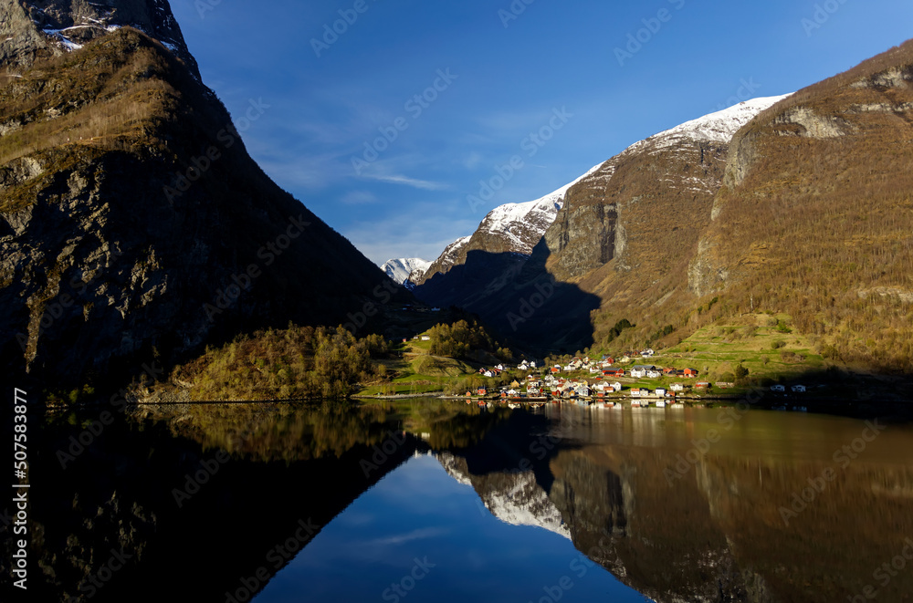 Scenic rural Norway mirror reflection of glacial fjord