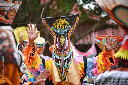 Phi Ta Khon Festival in During June - July in Loei Province, young people dressed colorful and masks and dance with fun. traditional the show art and culture Dan Sai or halloween of Thailand photo