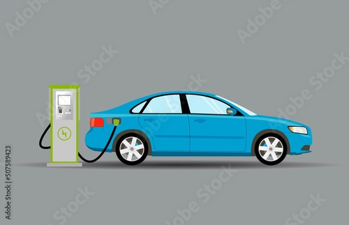 Fototapeta Naklejka Na Ścianę i Meble -  Recharging a blue passenger car at an electric charging station.