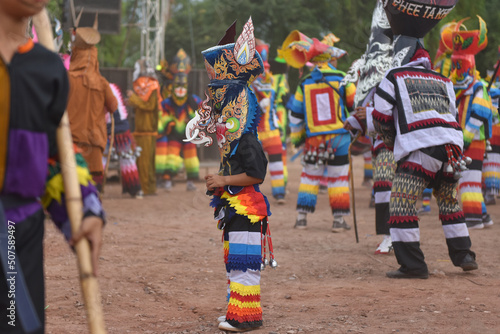 Phi Ta Khon Festival in During June - July in Loei Province, young people dressed colorful and masks and dance with fun. traditional the show art and culture Dan Sai or halloween of Thailand