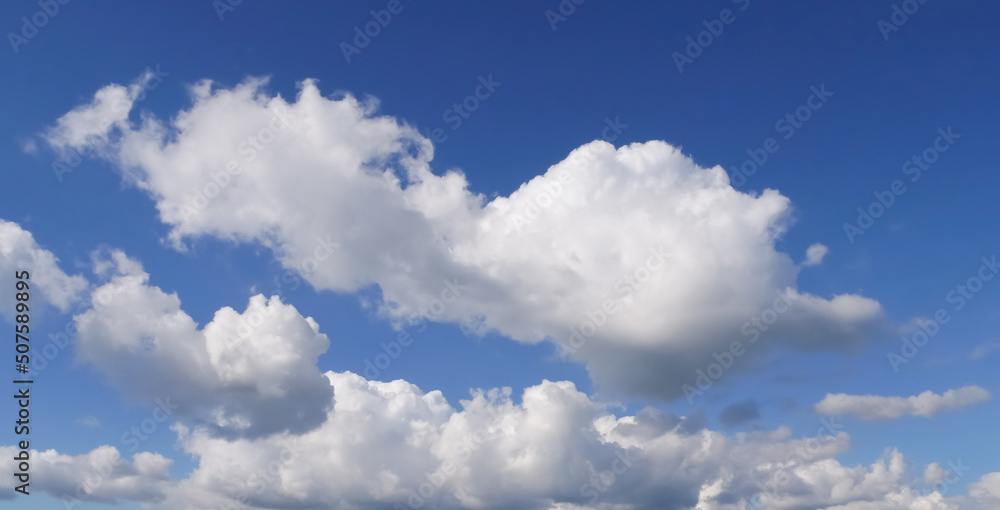 Big clouds over navy-blue skies Big clouds over navy-blue skies