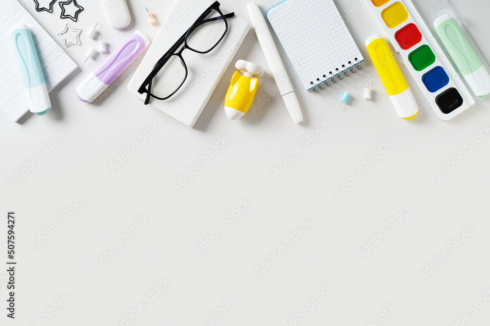 Back to school theme with white schools tools on white background