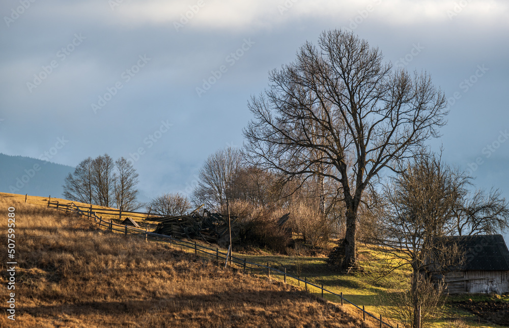 Last good weather days in autumn mountain countryside. Peaceful picturesque Ukrainian Carpathians mountains scene.