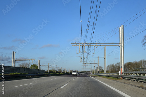 E-highway, test section with electric overhead lines for hybrid trucks on the autobahn in Schleswig Holstein, Germany, copy space