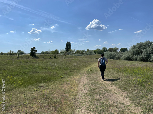 Weg mit Wanderer (weiblich) durch die Dünen der Banater Sandwüste, Vojvodina, Serbien photo