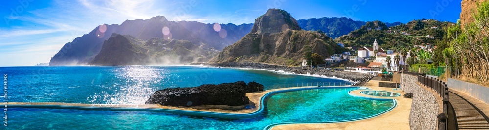 Scenic Madeira island, natural swimming pools of charming Porto da Cruz village. Popular tourist resort in Portugal - obrazy, fototapety, plakaty 