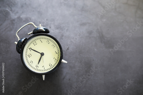 Wallpaper Mural Big alarm clock. The clock is on the table. The inscription "time". Time for rest and travel. Torontodigital.ca