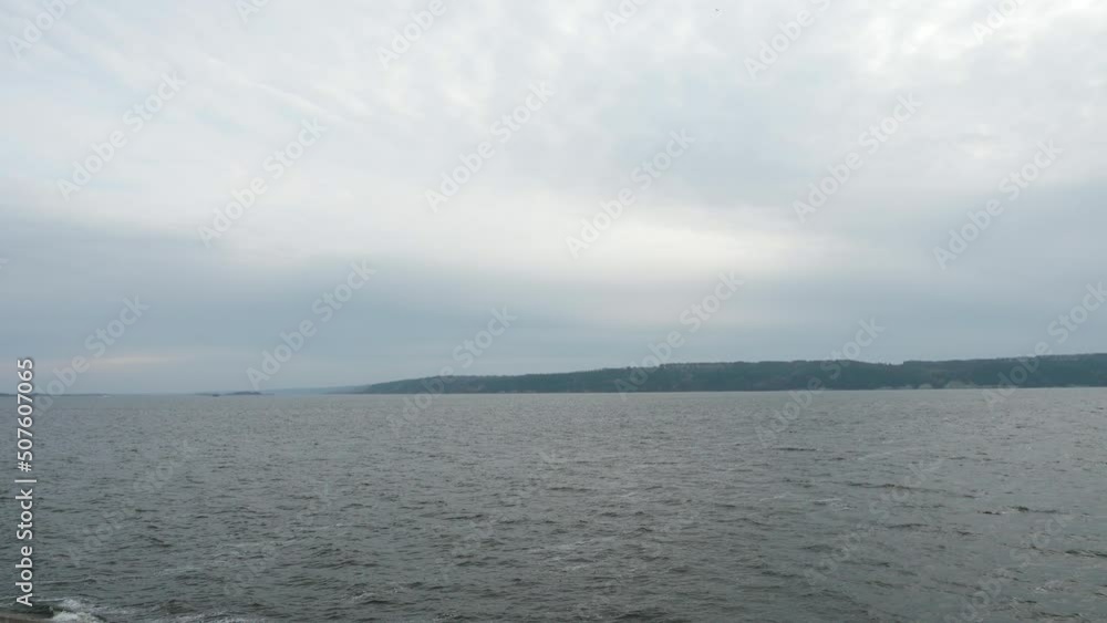 Car Side Window View on Dnieper River Reservoir Ukraine Europe. Overcast Cloudy Sky. Autumn Winter Season. 2x Slow motion 60fps 4K Car Side Window View on Dnieper River Reservoir Ukraine Europe. Overcast Cloudy Sky. Autumn Winter Season. 2x Slow motion 60fps 4K