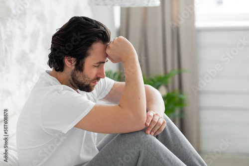 Konstfotografi Closeup of depressed millennial guy having bad days