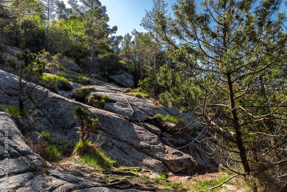 A climbing support rope on a hiking route to Lifjel mountain, Sandnes, Norway, May 2018