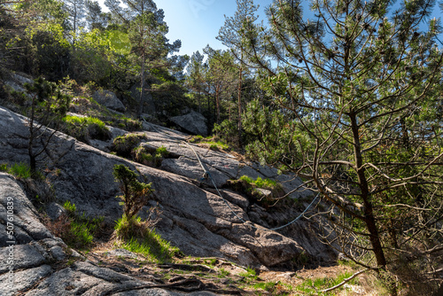 Obraz na płótnie A climbing support rope on a hiking route to Lifjel mountain, Sandnes, Norway, May 2018 w salonie