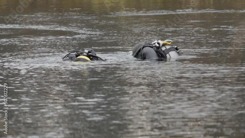 Diving Divers in the Lake

