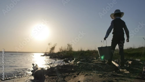 the boy with the Bucket runs parallel to the Shore
