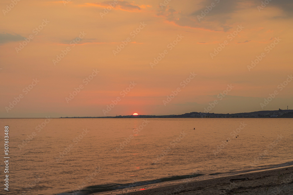 Beautiful view of red sunset in Mediterranean sea. Greece. Beautiful view of red sunset in Mediterranean sea. Greece.