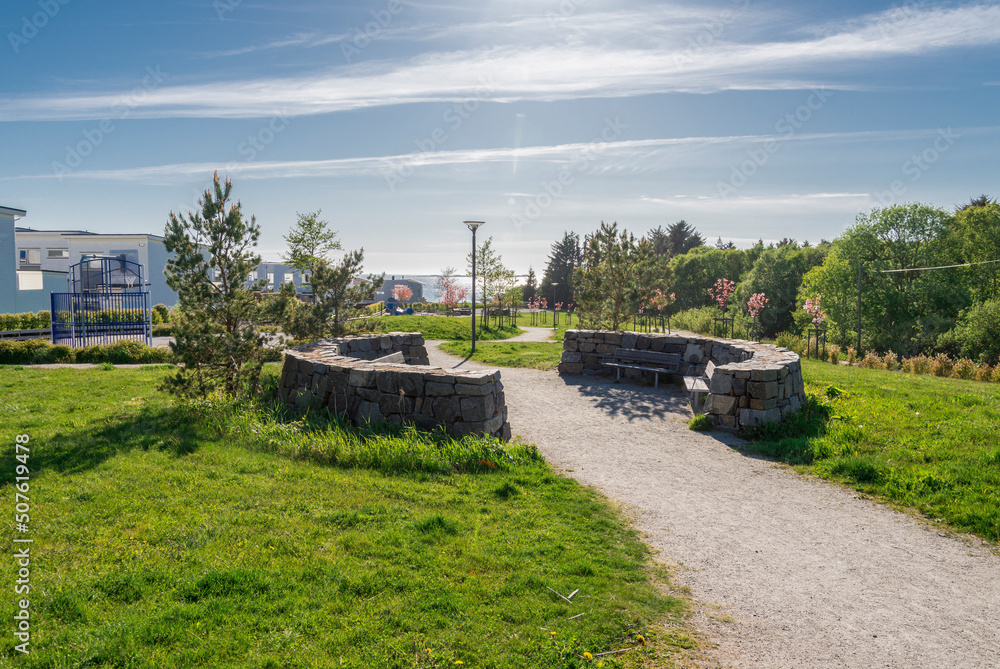 A footpath in Tananger leading to Sjobadet Myklebust public sea swimming pool, Norway, May 2018