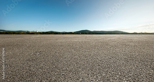 Panorama big field view of asphalt road with sky landscape .