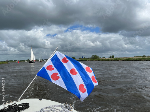 Frisian flag at a boat on the Sneekermeer