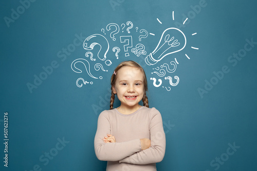 Portrait of child girl smiling. Success, idea and innovation concept
