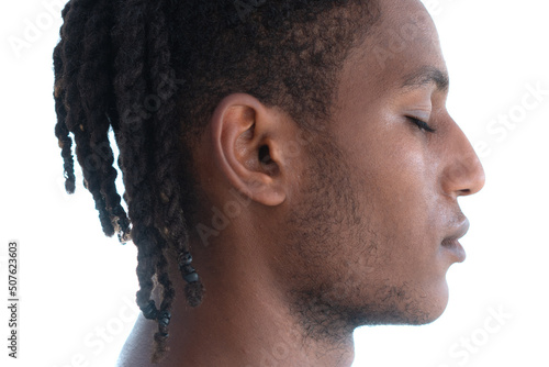 A simple portrait of a black man against a white background