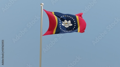 Mississippi flag on flagpole. MS flag fluttering in the wind. USA.