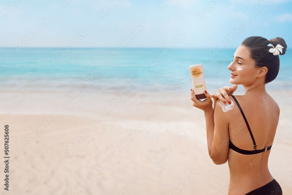 Woman smile applying sun cream on shoulder. Skincare. Body Sun protection. sunscreen. Female Using moisturizing lotion on skin.Skin Protection and dermatology Woman smile applying sun cream on shoulder. Skincare. Body Sun protection. sunscreen. Female Using moisturizing lotion on skin.Skin Protection and dermatology