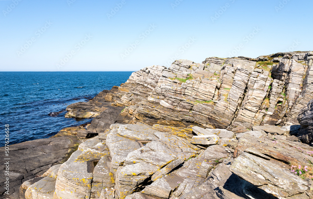Large rocks and geological formations along the coastline in Kvernevik suburb, Stavanger, Norway, May 2018