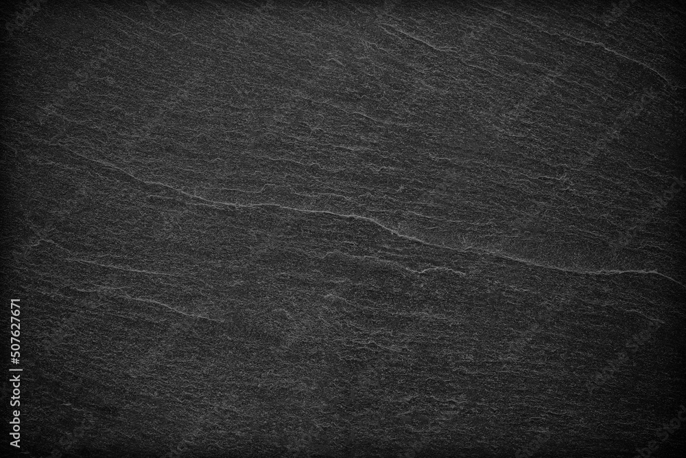 Fototapeta premium Dark grey black slate background or texture.