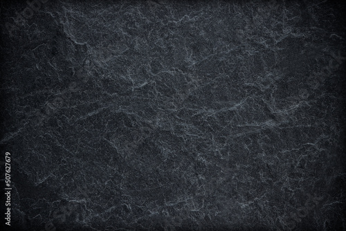 Dark grey black slate background or texture.