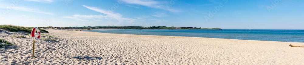 Panoramic view of Solastranda beach long strip of white sand in the beginning of summer, Stavanger, Norway, May 2018