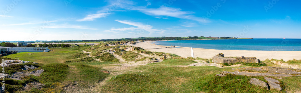 Panorama of Sola beach, sand dunes and resort hotel in the beginning of summer, Stavanger, Norway, May 2018