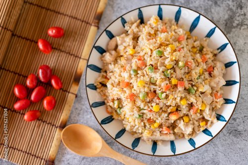 Fried rice with chicken and vegetable on the table