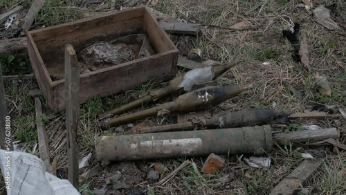 Unexploded grenades on the ground