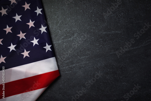 Flag of United States of America on marble background, layout image