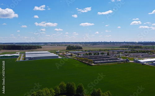 Aerial view of the rural landscape with agro farms barns and stables. Chicken coops
