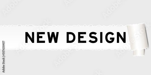 Ripped gray paper background that have word new design under torn part