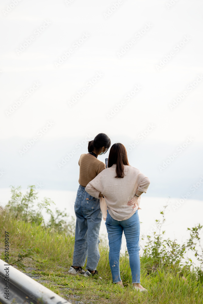 both male and female people walking and sitting on vacation with family Stay with beautiful nature, bright sky, green trees, good atmosphere. Khao Yai Thiang, Thailand Date 28-05-2022 both male and female people walking and sitting on vacation with family Stay with beautiful nature, bright sky, green trees, good atmosphere. Khao Yai Thiang, Thailand Date 28-05-2022